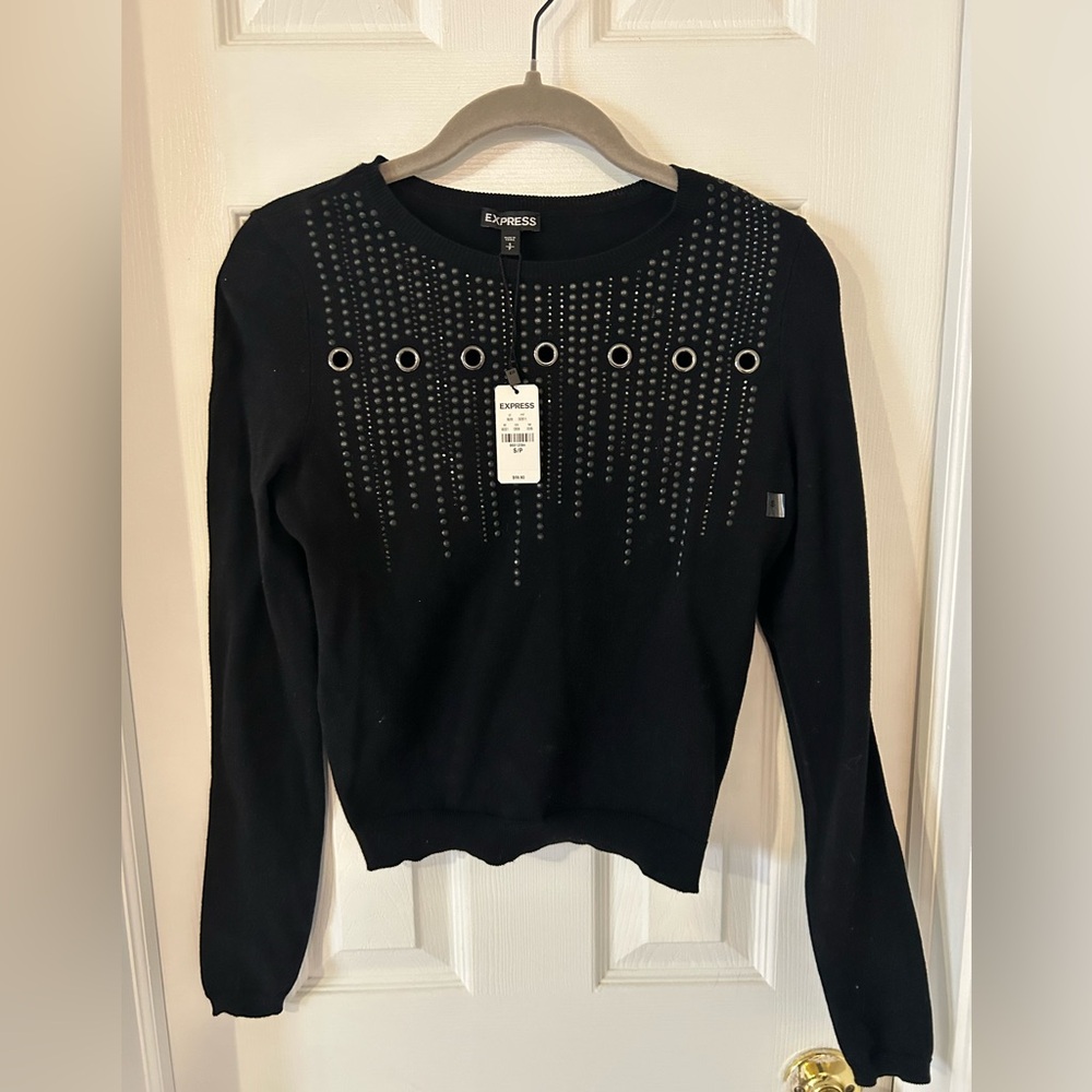 Express Woman’s Black long sleeve top with grommet decoration size small